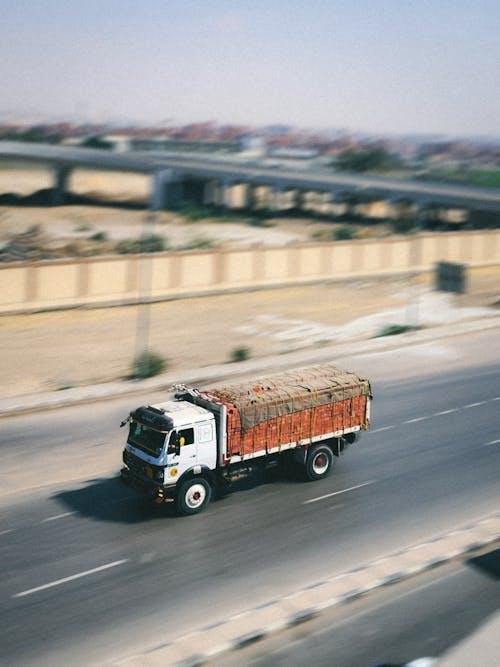 A truck driving on the highway, staying on schedule with reliable diesel delivery