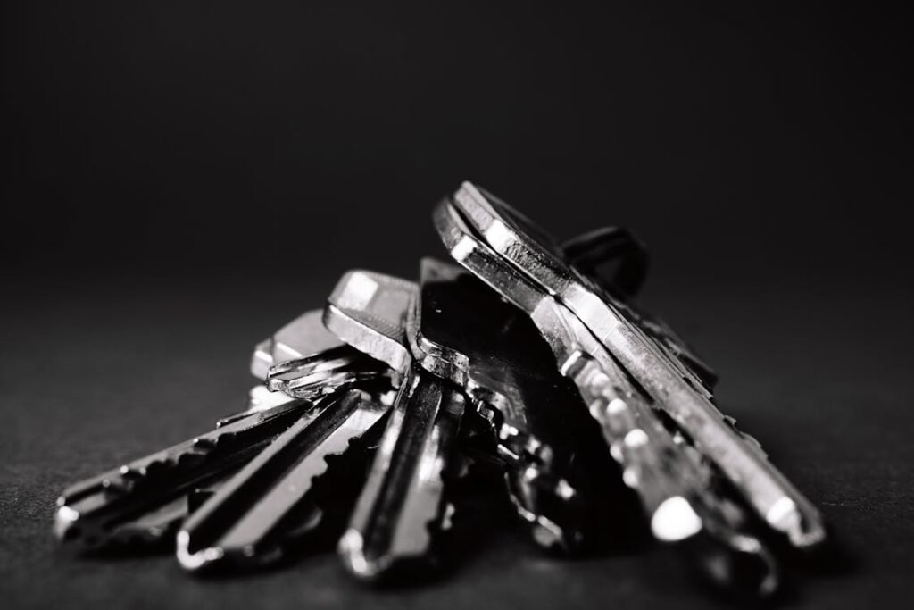A close-up view of multiple keys on a keyring.