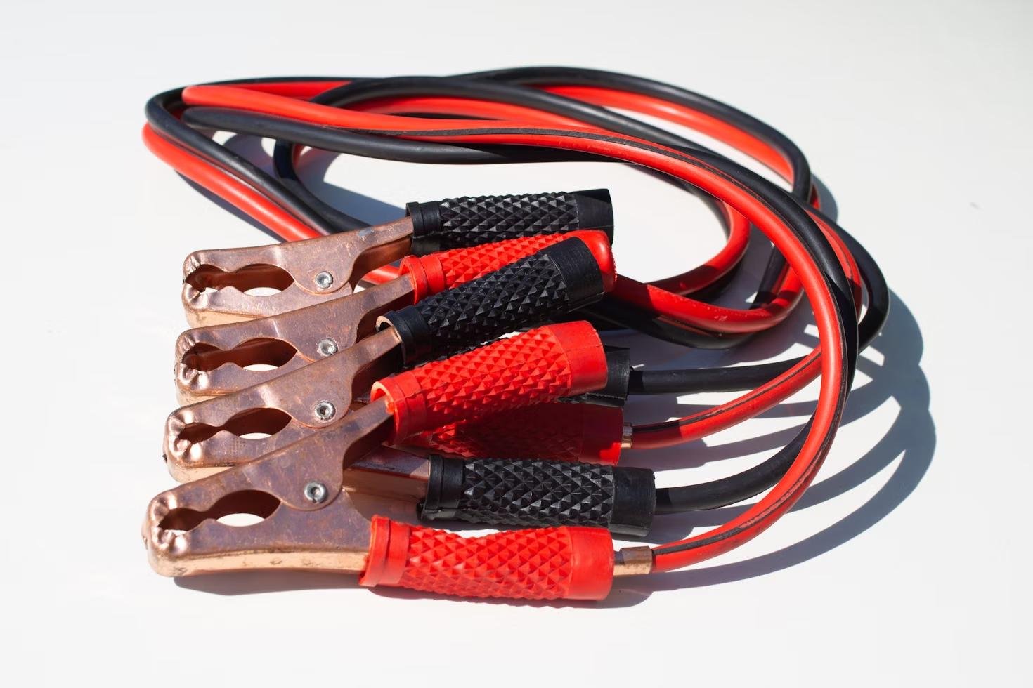 An image of a red and white jumper cable