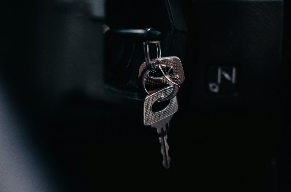 Car keys hanging from the ignition